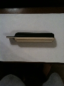 A knife that is sitting on top of a table.